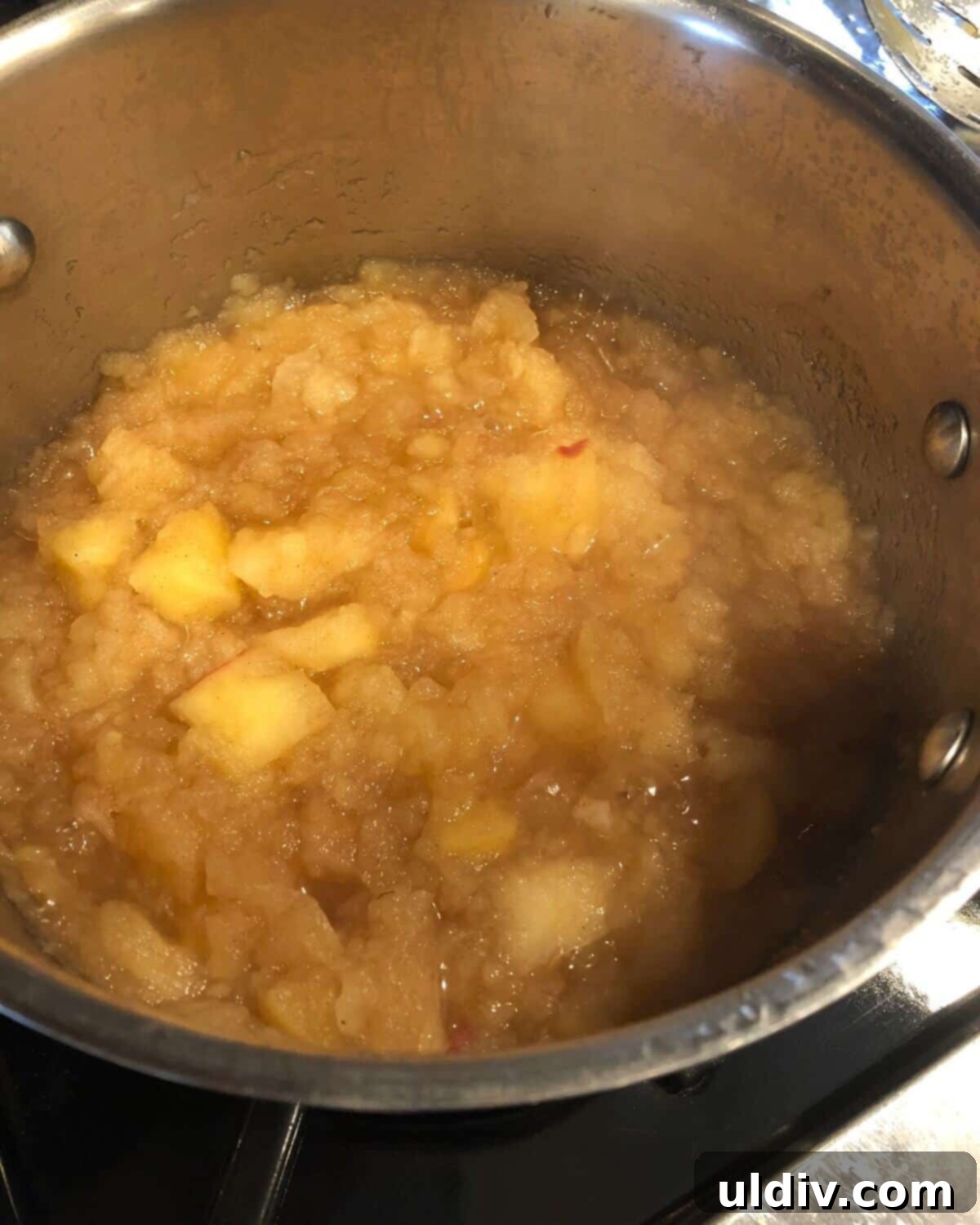 cooked applesauce in a pot.