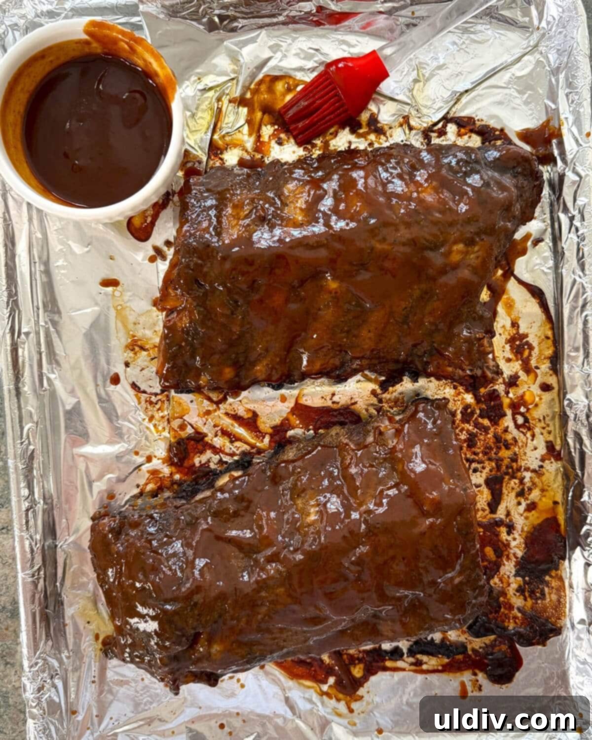 Meltingly Tender Baked Baby Back Ribs 8 BBQ sauced baby back ribs.