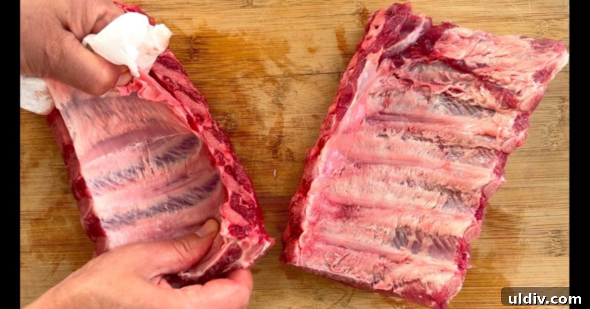 Meltingly Tender Baked Baby Back Ribs 9 Removing the membrane from ribs.