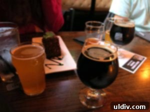 Gino's East Hosts Chicago Craft Beer Week Tap Takeover 24 Two glasses of craft beer on a wooden table, inviting patrons to enjoy