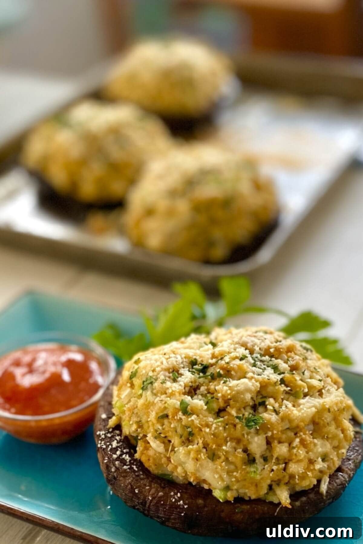 Savory Crab Stuffed Portobellos 12 crab stuffed portobello with sauce.