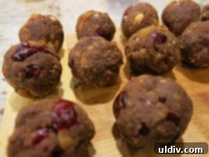 Post-Christmas Leftover Rescue: Cocoa Fruit Balls 6 Hand rolling cocoa and fruit balls into uniform shapes
