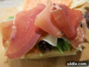 Mediterranean Sunshine Panino: Manchego & Jamón Serrano 6 Thinly sliced Jamón Serrano placed over Manchego cheese in a panino
