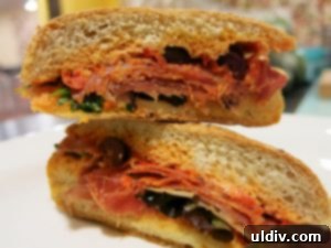 Mediterranean Sunshine Panino: Manchego & Jamón Serrano 10 A perfectly grilled Manchego and Jamón Serrano panino, cut in half and served with extra red pepper dip
