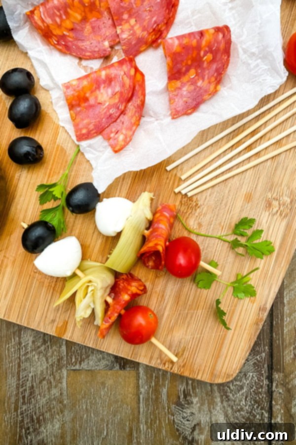 No-Fuss Antipasto Picks 4 A tray of beautifully arranged antipasto skewers, ready for serving.