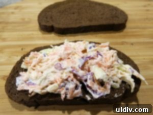 Emerald Feast: My St. Patrick's Day Sandwich 5 Coleslaw spread on toasted pumpernickel bread