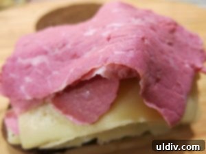 Emerald Feast: My St. Patrick's Day Sandwich 10 Second layer of Swiss cheese and corned beef