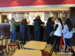 Graeter's Ice Cream Arrives in Winnetka: Indulge in Handcrafted Perfection 4 Customers lining up at Graeter's Ice Cream counter, making selections