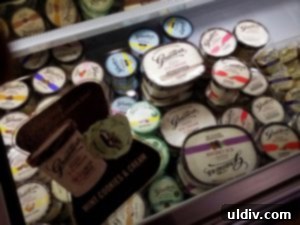 Graeter's Ice Cream Arrives in Winnetka: Indulge in Handcrafted Perfection 6 Shelves stocked with Graeter's candy bars, ice cream toppings, and syrups