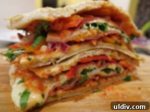The Naan Sandwich: Decadence, Flavor, and Modern Craze 2 Delicious Naan Sandwich with Fresh Vegetables and Melted Cheese