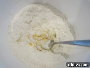 Sweetest Mom, Sweetest Treat: Decadent Mango Crepes for Mother's Day 3 Mixing eggs, flour, butter, and salt for crepe batter