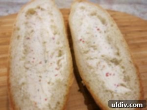 Easy Breezy Cheesy Veggie Sandwich With a Goat Cheese Zing 7 Goat cheese spread evenly on the inside of a halved bread roll
