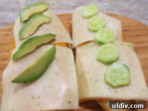 Easy Breezy Cheesy Veggie Sandwich With a Goat Cheese Zing 10 Sliced cucumber on one half of the sandwich, avocado on the other
