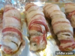 Memorial Day Sausage Sandwich Sizzle Not Your Average Pigs in a Blanket 6 Close-up of a perfectly wrapped bacon sausage
