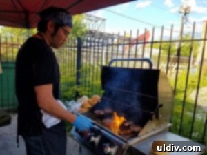 Culinary Fight Club Blended Burger Challenge: Fierce Flavors, Noble Cause 7 Chef Kim grilling blended burgers