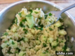 Delicious Salmon Heirloom Tomatoes and Millet A Feast of Freshness and Life 8 Warm millet salad with chopped cucumber, parsley, and olive oil, a healthy side dish