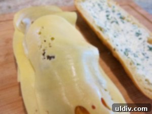 When life gives you eggplants, elevate them into an irresistible sweet pepper panino. 16 Adding final Emmental cheese slices
