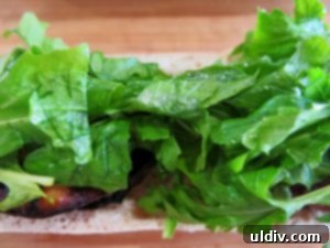 Summer's Secret Goodbye: The Ultimate Grilled Veggie Sandwich 15 Grilled onions and Peruvian Sweety Drop peppers added to the sandwich