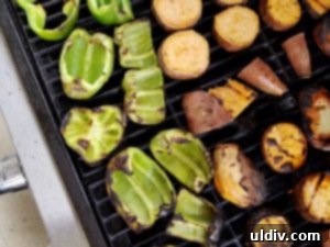 Summer's Secret Goodbye: The Ultimate Grilled Veggie Sandwich 5 A vibrant assortment of grilled vegetables fresh off the barbecue