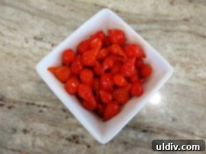 Summer's Secret Goodbye: The Ultimate Grilled Veggie Sandwich 6 Peruvian Sweety Drop peppers in a bowl, showcasing their vibrant red color