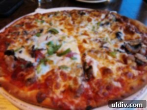 Angelo's Wine Bar: My Roman Rhapsody of Flavors 9 The Angelo's Pizza with Italian sausage and vegetables