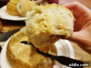 A comforting bowl of soup and a warm bread boule from Zoup!