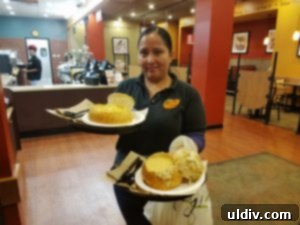 Zoup! manager Mariana serving delicious soup and bread boules to guests.