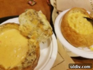 A close-up of a parmesan garlic bread boule, rich and inviting.