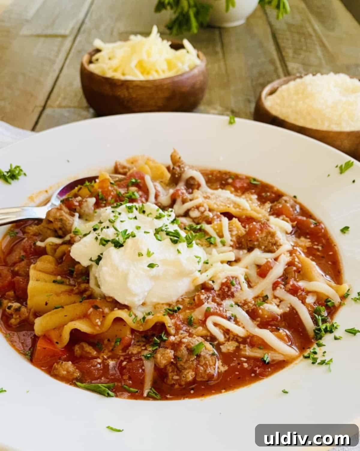 Easy One Pot Lasagna Soup 8 hot bowl of lasagna soup with a spoon