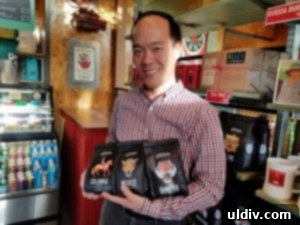 Colectivo Coffee Logan Square Brewing Stories One Sip at a Time 5 Coffee beans and hands, symbolic of direct trade