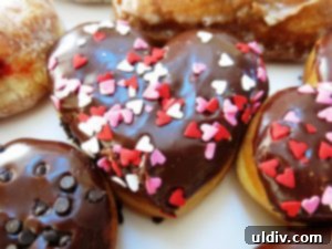 Valentine's Day Restaurant Guide: Ignite Romance, Savor Flavors 2 Romantic Valentine's Day dinner setting with wine glasses and flowers