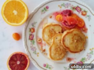 Delicious pancakes and waffles spread out on a table for dinner