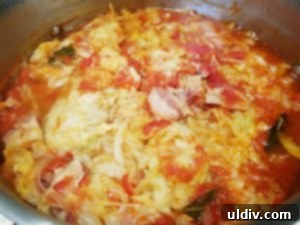 Easter's Heartwarming Cabbage Rolls A Tale of Tradition 15 Plated cabbage rolls served with a generous dollop of sour cream