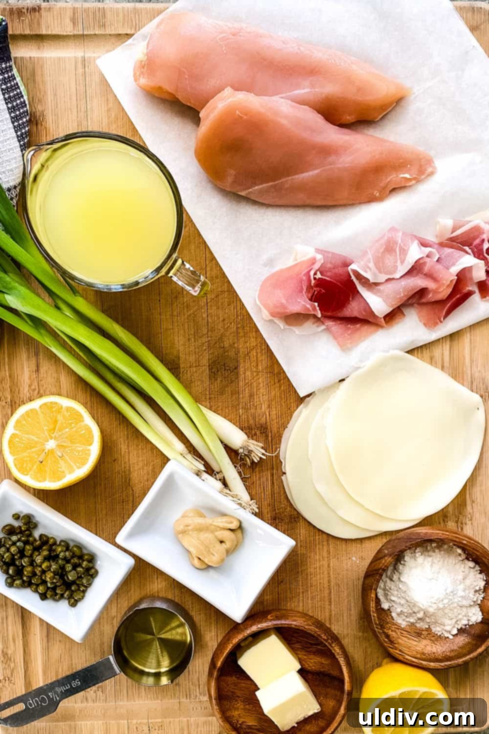 Sun-Kissed Lemon Wine Chicken with a Prosciutto-Provolone Core 3 Raw chicken breasts ready to be stuffed with prosciutto and provolone cheese