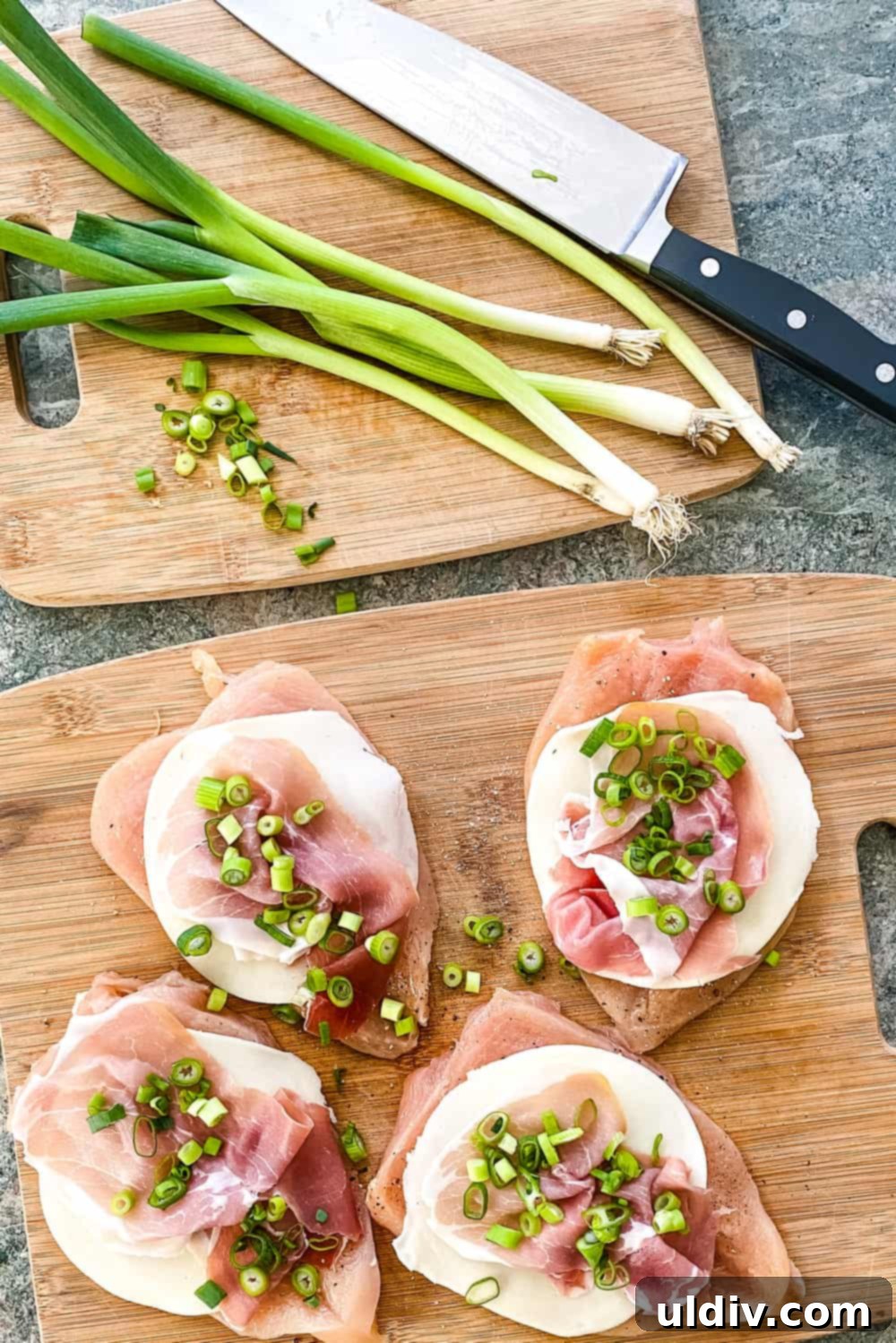 Sun-Kissed Lemon Wine Chicken with a Prosciutto-Provolone Core 4 Close-up of stuffed chicken breast with provolone and prosciutto before cooking