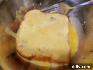Michelle and Nellie's Heartwarming Pre-Mother's Day Cook-Along 16 Dipping brioche in French toast batter