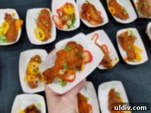 WingFest 2018 A Flavorful Dash Against Time 2 A vibrant display of various chicken wings, from mild to fiery, showcasing the diverse flavors at Chicago's WingFest.