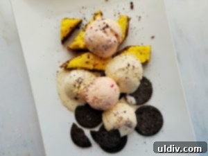 Memorial Day Ice Cream Overload 7 Layered Ice Cream Dessert with Cake and Cookies