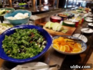 Beyond the Flame: A Vegetarian Spring Sojourn at Fogo de Chão, Savoring Watermelon Fresca 4 An inviting spread of fresh, colorful salads and gourmet ingredients on Fogo de Chão's Market Table.