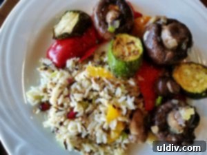 Beyond the Flame: A Vegetarian Spring Sojourn at Fogo de Chão, Savoring Watermelon Fresca 9 A perfectly balanced vegan plate from Fogo de Chão's Market Table, showcasing a variety of fresh and roasted vegetables and grains.