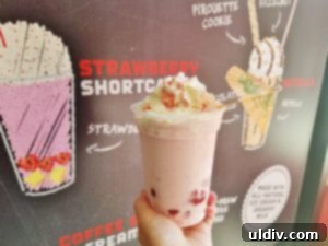 Summer Chill Shakes and Gazpacho 10 A refreshing Strawberry Shortcake milkshake from Epic Burger, garnished with fresh berries.