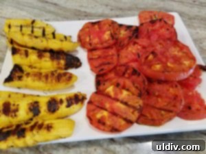Grilled Veggie Panino Still My First Flame 6 Grilled tomatoes and other vegetables resting on a plate
