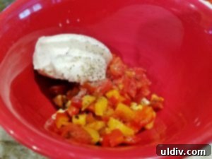Grilled Veggie Panino Still My First Flame 7 Chopped grilled vegetables mixed with sour cream, salt, and pepper in a bowl