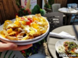 Lark in Boystown İncelemesi İşçi Bayramı Hafta Sonu Brunch'ı İçin Damak Şöleni 6 Traditional Chilaquiles at Lark Chicago