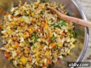 Elevated Quinoa Patties for Your Best Vegetarian Life 6 Mixing quinoa patty ingredients in a bowl