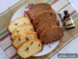 Nielsen Massey Summer Finale Review and Giveaway The Scent of Vanilla 2 Freshly baked pound cake with cranberries, ready to be sliced.