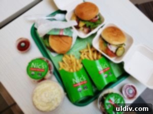 Nic's Organic Fast Food: Honest Flavors, Beyond Burgers and Fries 4 Close-up of a Nic's Organic Fast Food burger with fresh ingredients