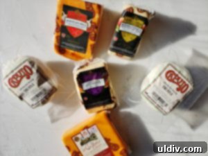 Sandwich Status: Truffle Mozzarella Upgrade 3 Assortment of specialty cheeses from Caputo Cheese Market, featuring truffle ovolini