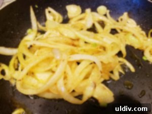 Golden brown onions, infused with harissa