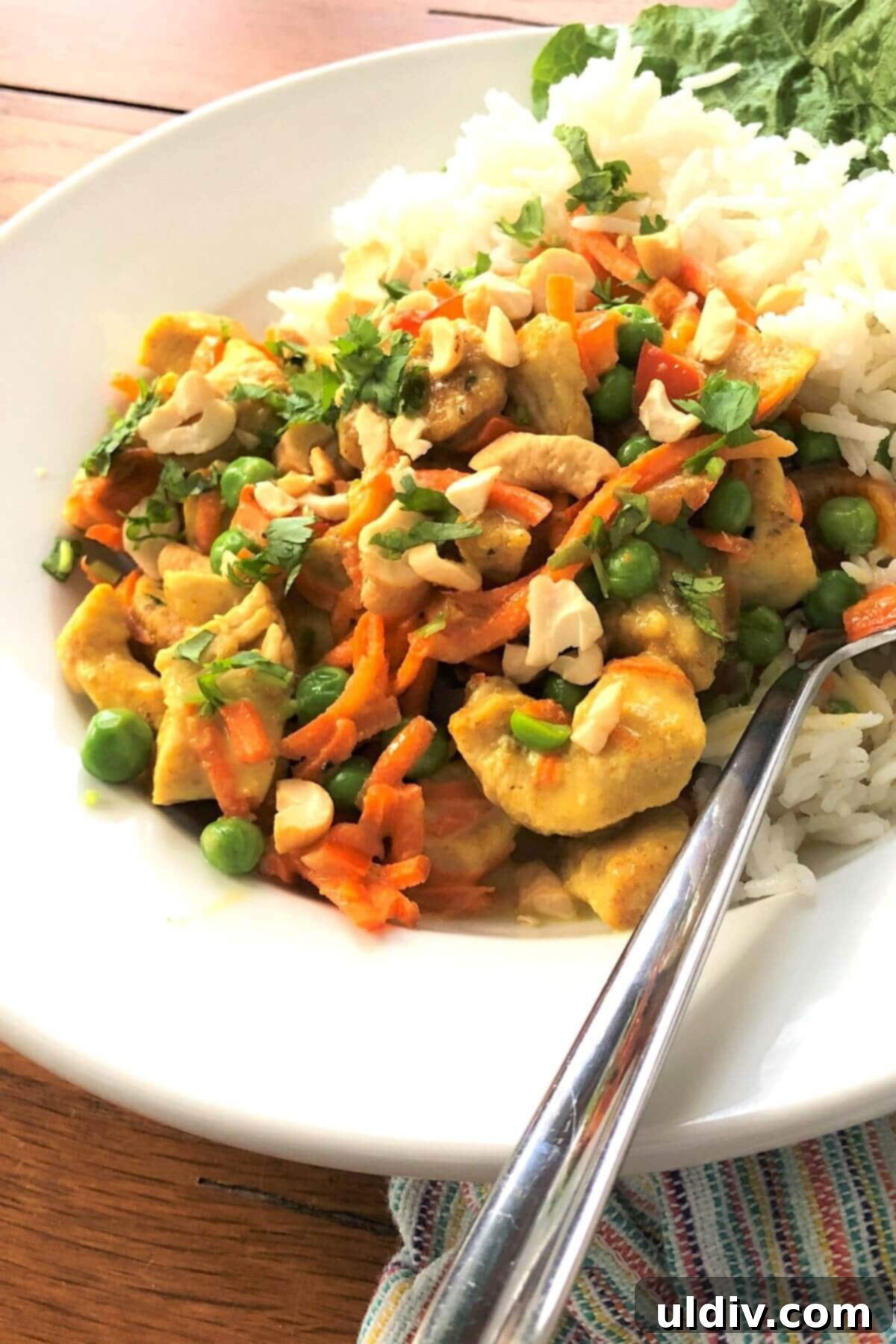 Velvety Thai Coconut Chicken Curry 4 curry chicken in a bowl.